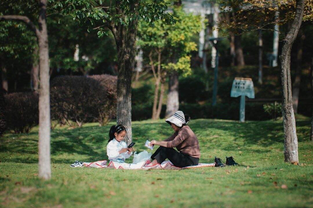 Seniors having a picnic together in a park