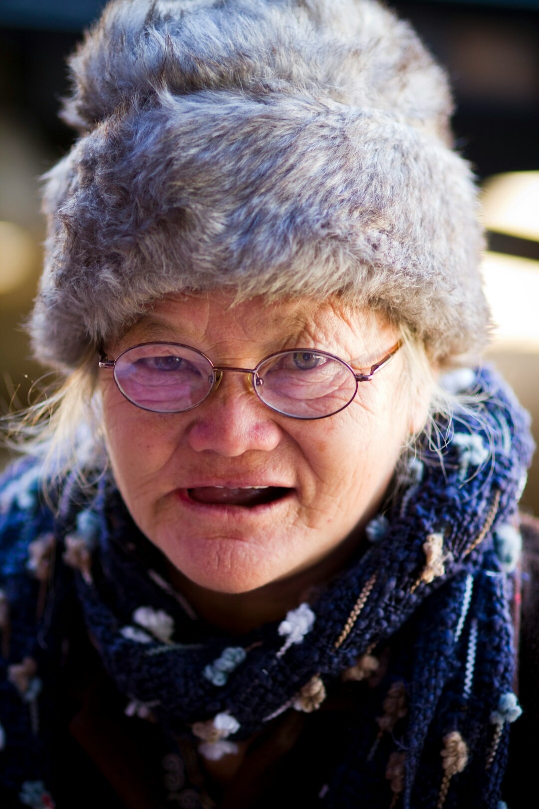 Portrait of a cheerful older woman with glasses