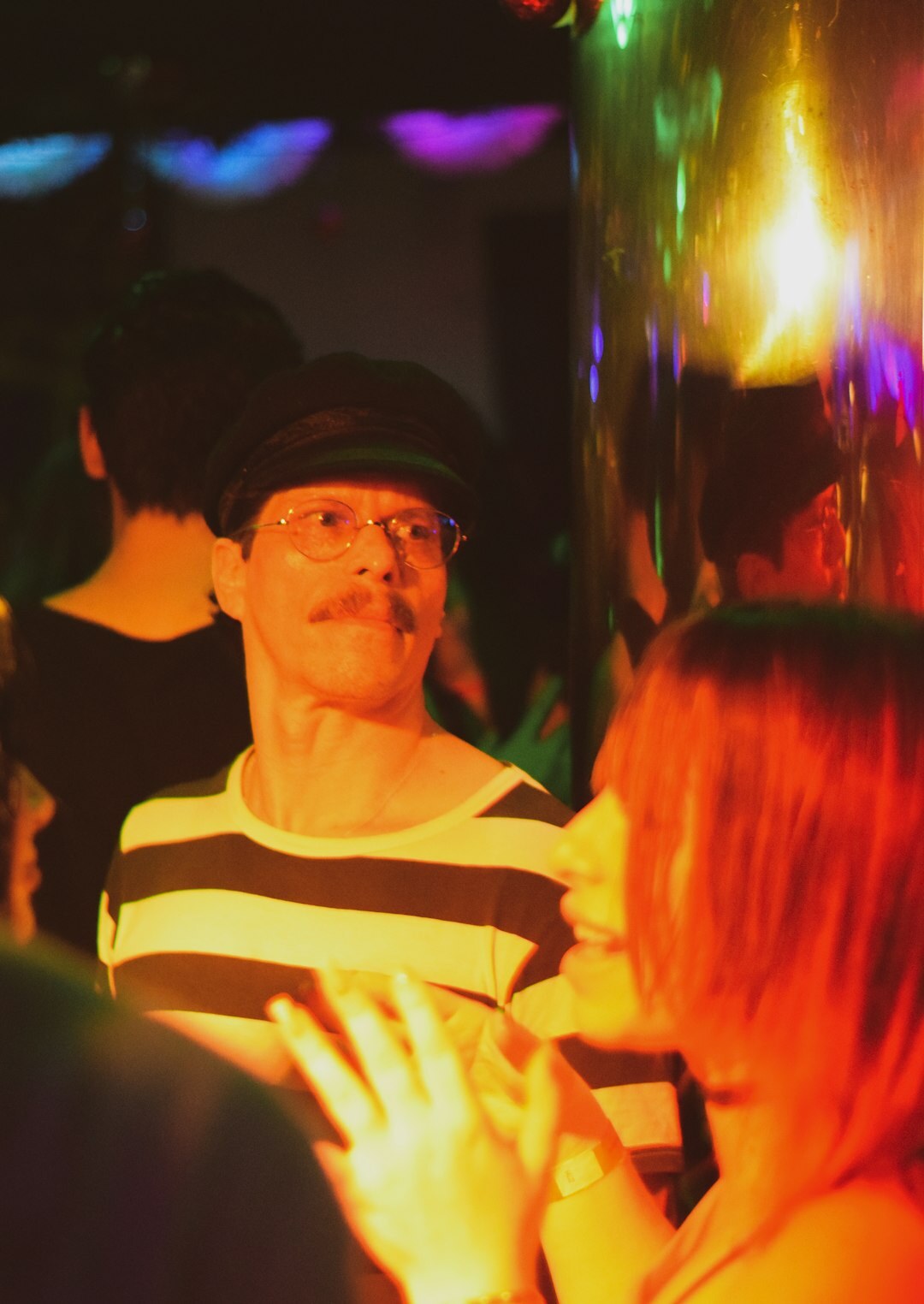 elderly people chatting in club