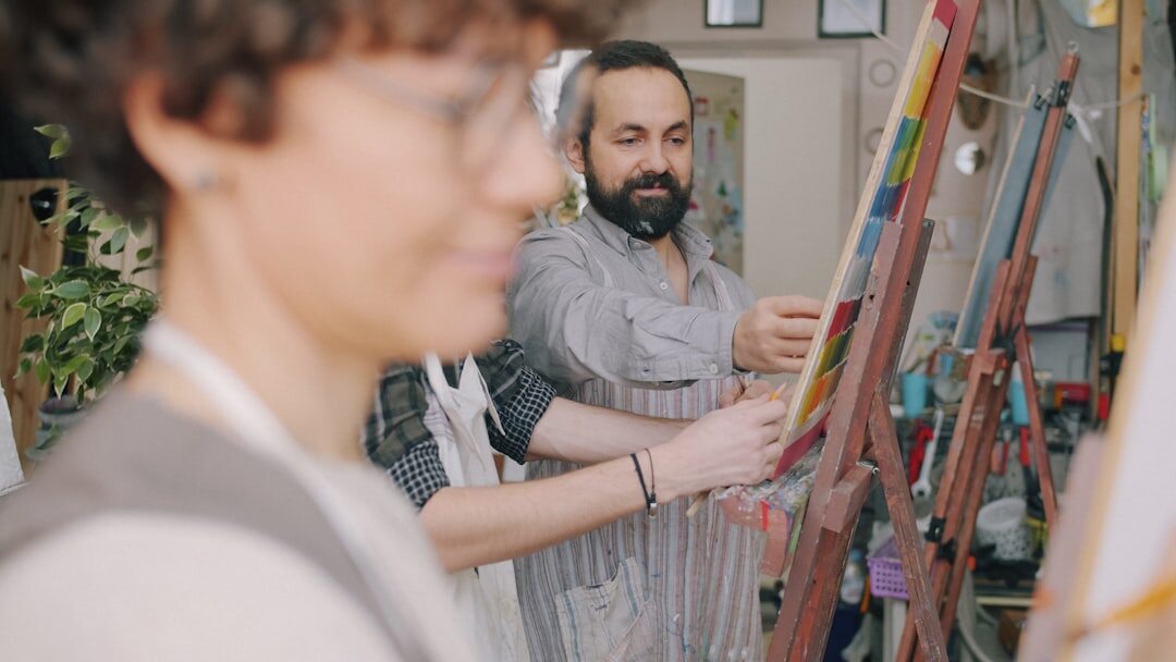 seniors painting in workshop