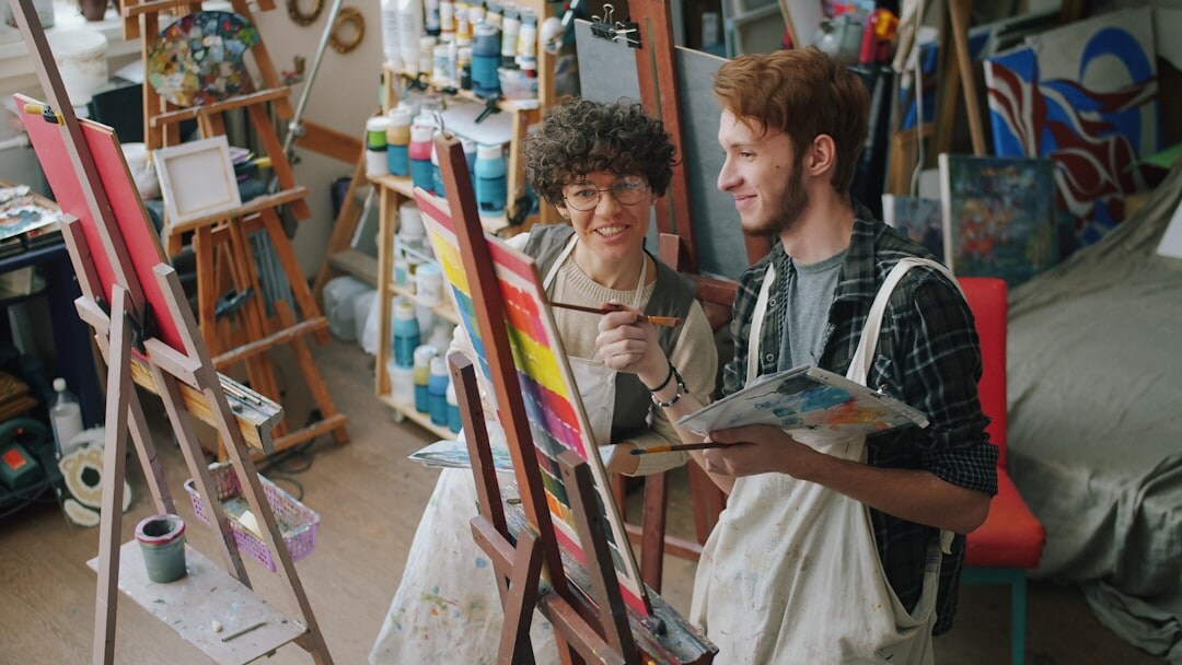 Seniors painting together in an art workshop